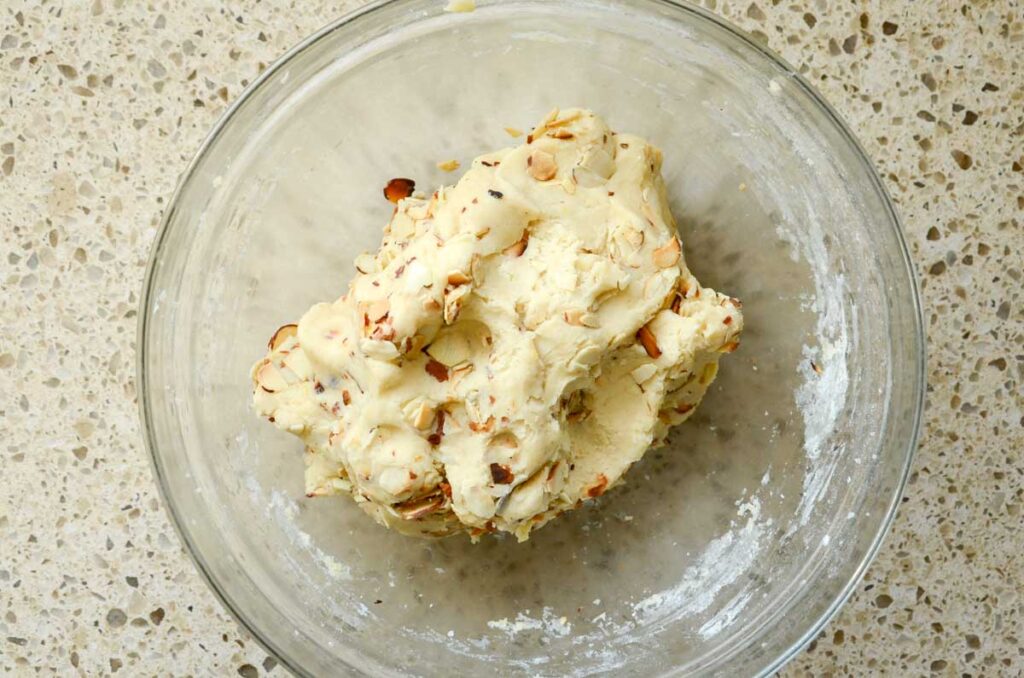 sourdough biscotti dough in a glass bowl