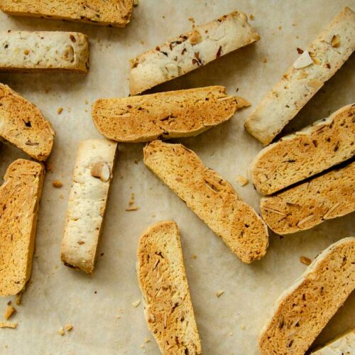 sourdough biscotti on a parchment lined baking sheet