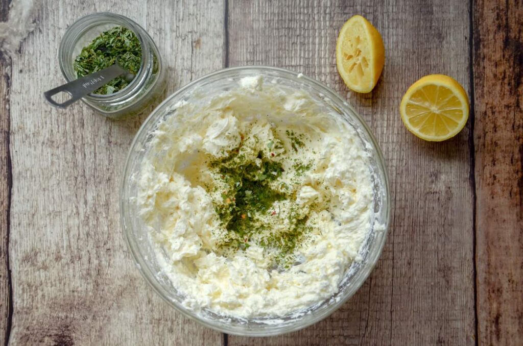 Cream cheese mixture for dip in a glass bowl 