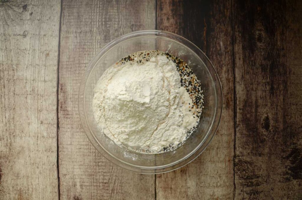 ingredients for sourdough bread in a glass bowl 