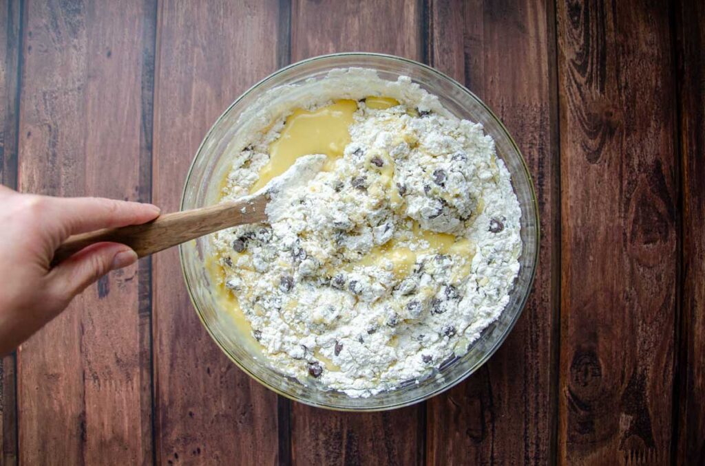 folding the dry ingredients into the wet ingredients