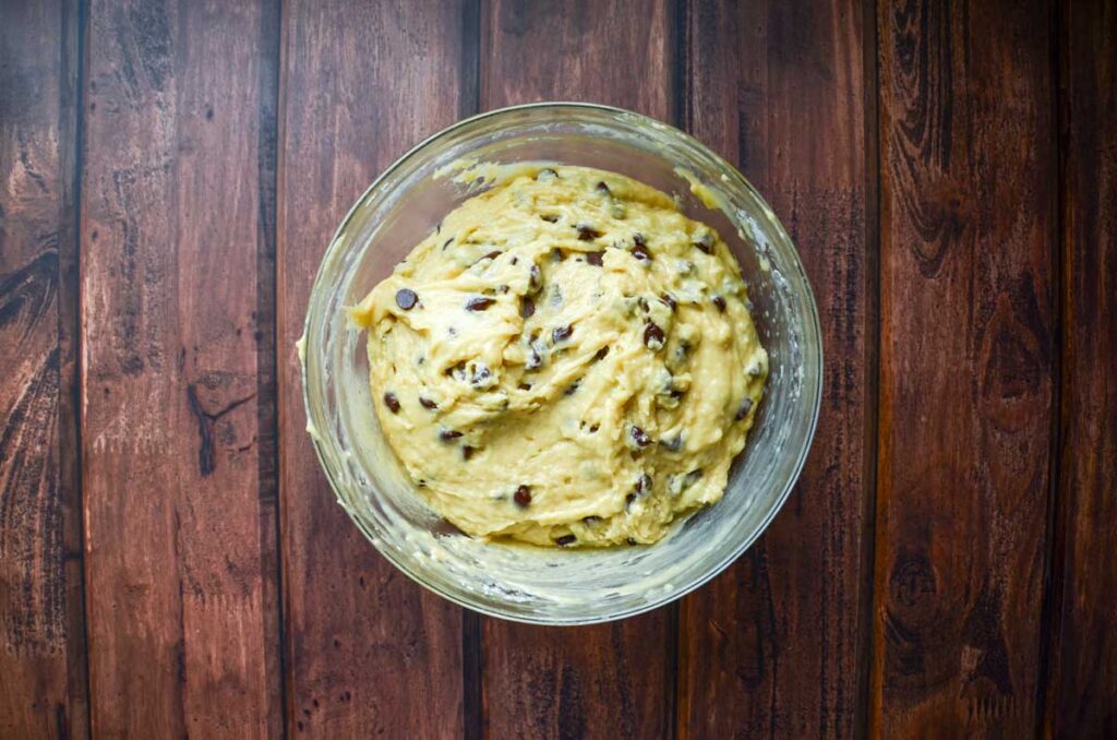 sourdough chocolate chip muffin batter in glass bowl