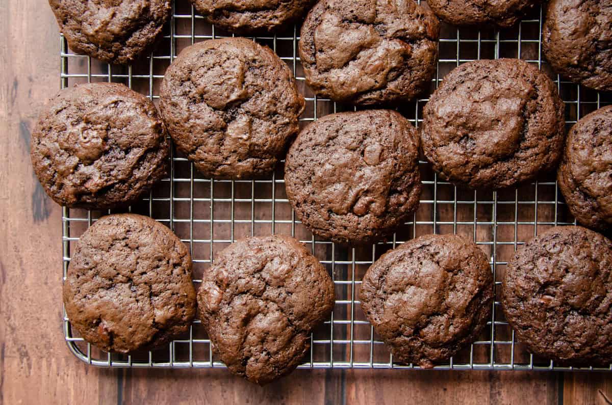 double chocolate sourdough cookies on a wire rack