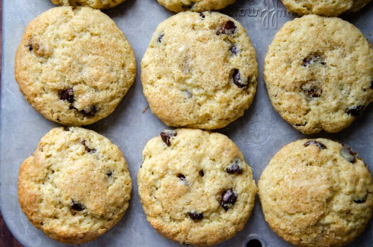 sourdough chocolate chip muffins in a muffin pan