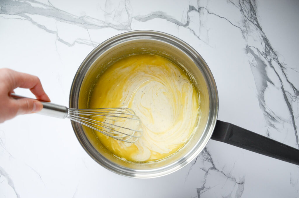 whisking sourdough discard into melted butter in sauce pan