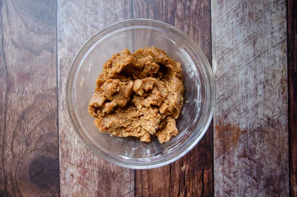 Cinnamon crumble mixture in a glass bowl