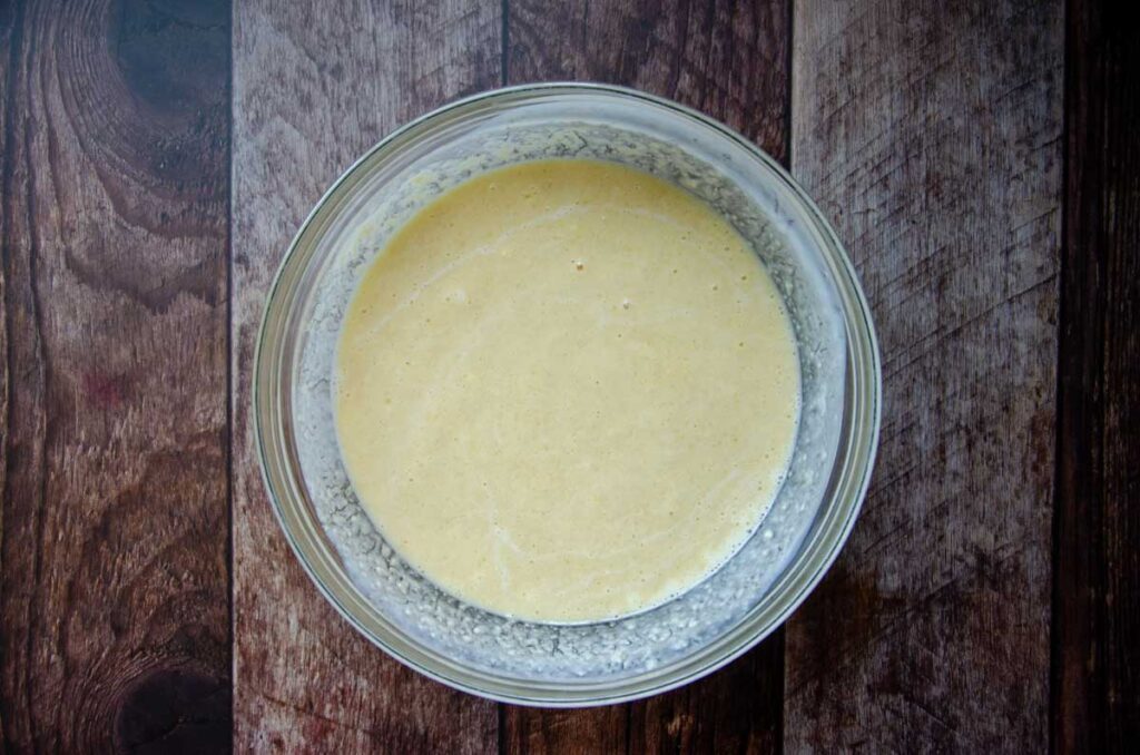 the sourdough coffee cake wet ingredients in a glass bowl