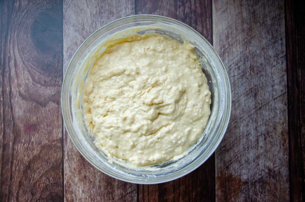 sourdough coffee cake batter in a glass bowl