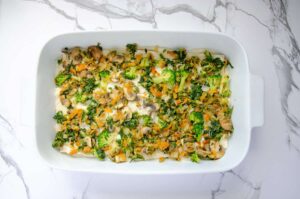 sauteed vegetables layered in baking dish