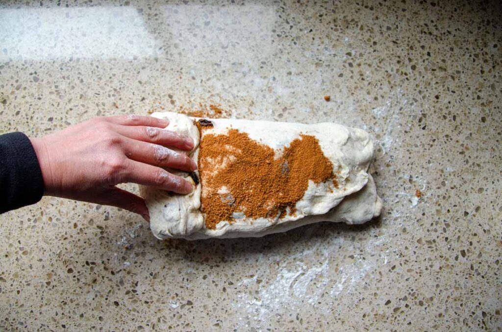 rolling the sourdough cinnamon raisin dough