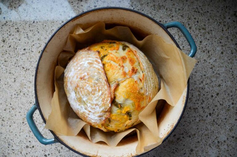 sourdough jalapeno cheddar bread in a Dutch oven