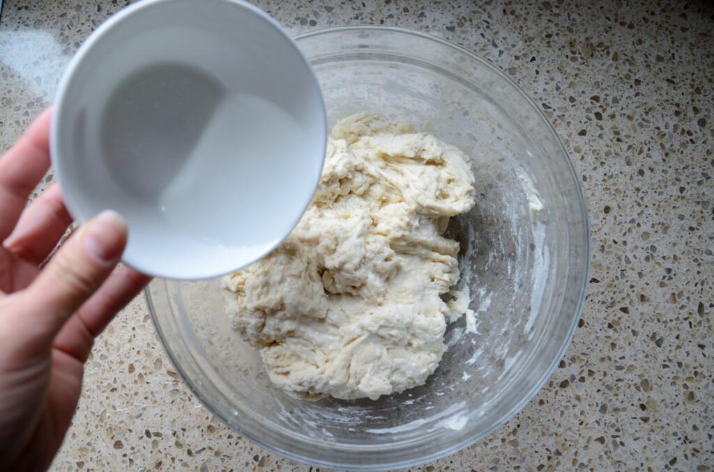 Adding salt water to the sourdough dough