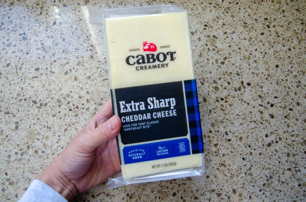a block of cheddare cheese
