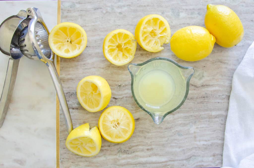 juicing lemons with a citrus press juicer