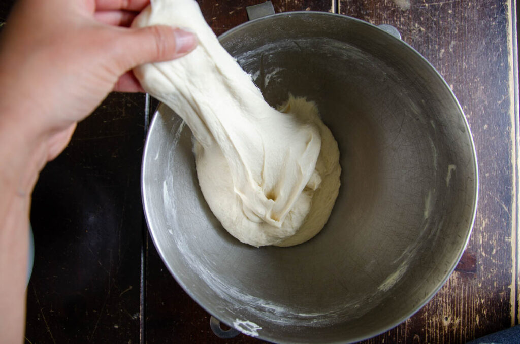 stretching sourdough sandwich bread dough