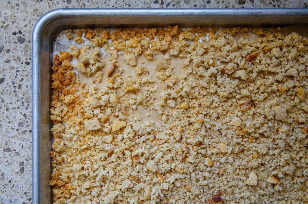 Sourdough bread crumbs on baking sheet