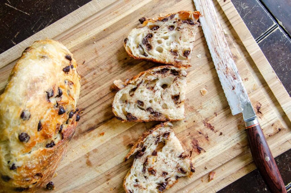 Sliced bread on wooden cutting board