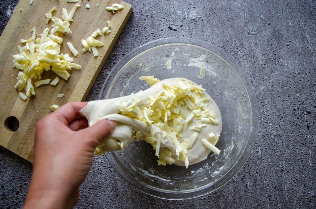 Butter shavings folded into dough
