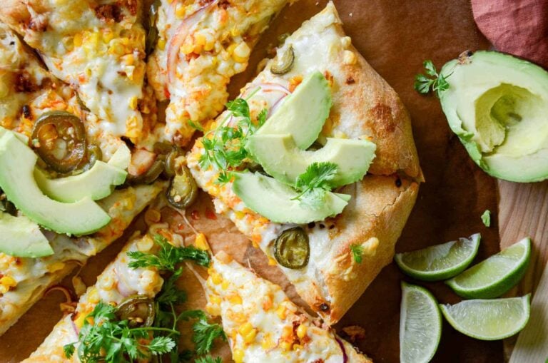 Chorizo pizza with avocado sliced