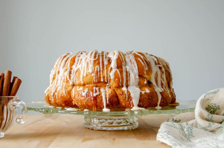 sourdough monkey bread on a glass cake stand