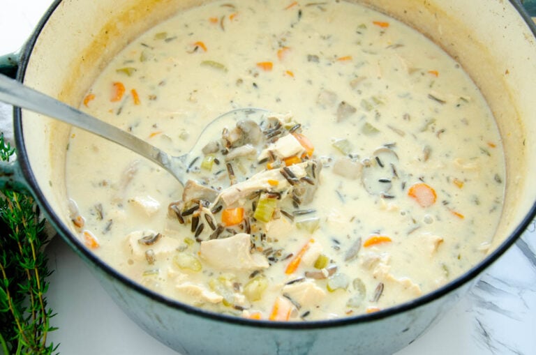 a Dutch oven full of turkey wild rice soup