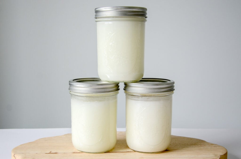 stacked mason jars filled with rendered lard