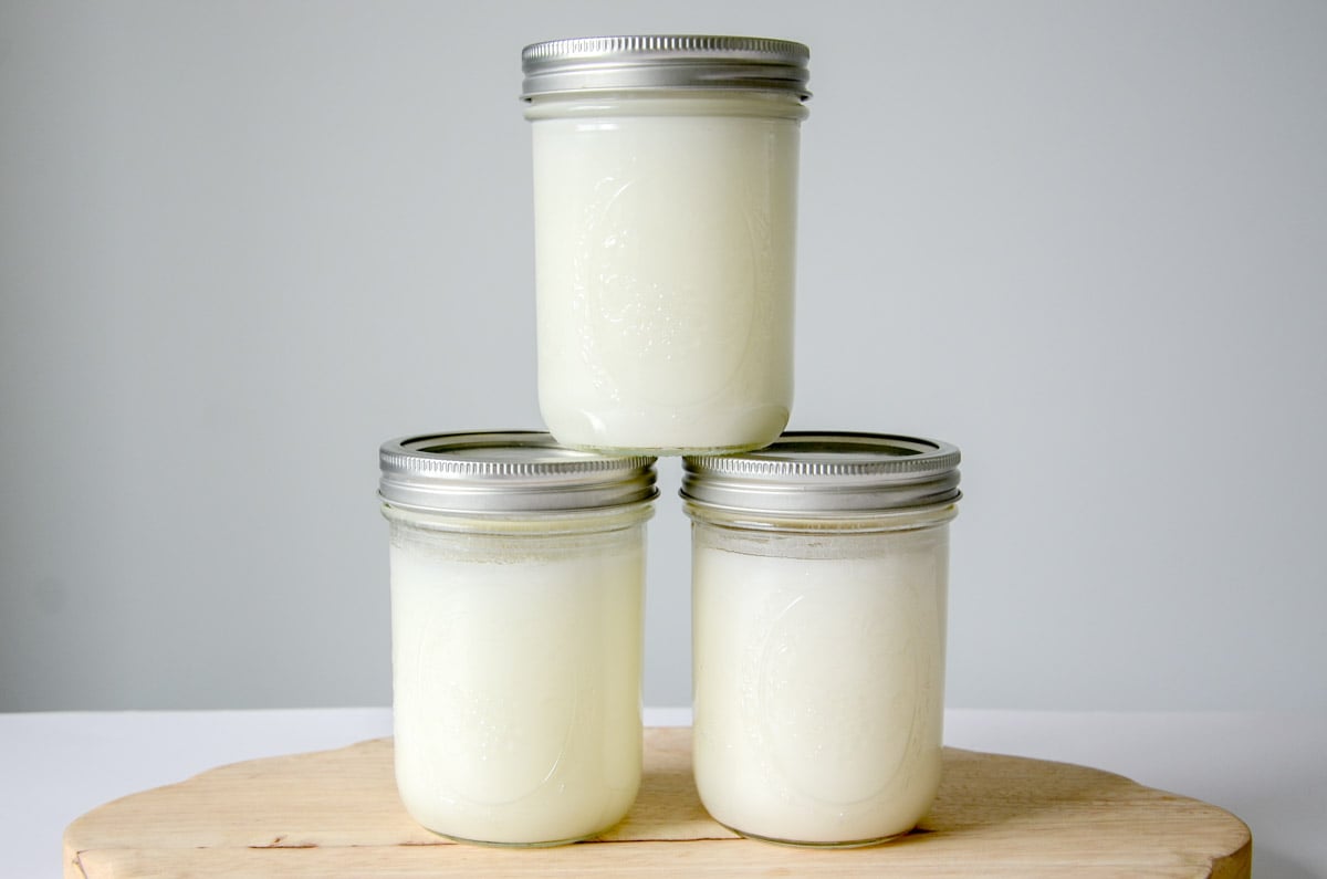 stacked mason jars filled with rendered lard