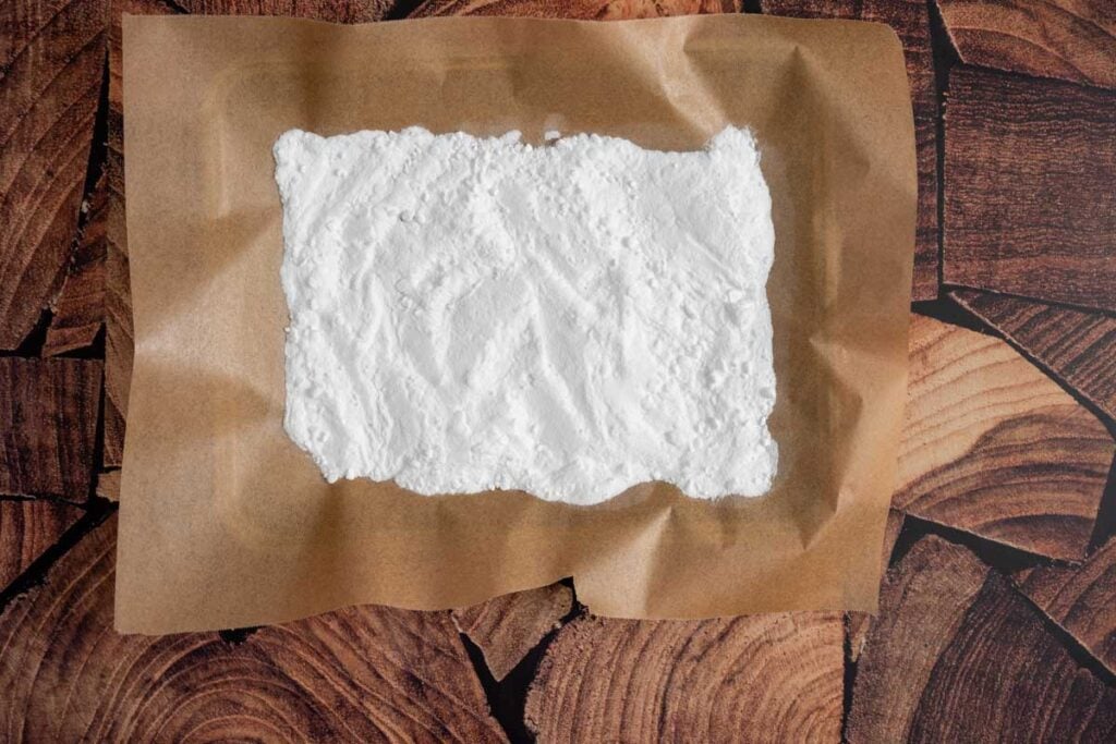 baking soda on a parchment lined baking sheet