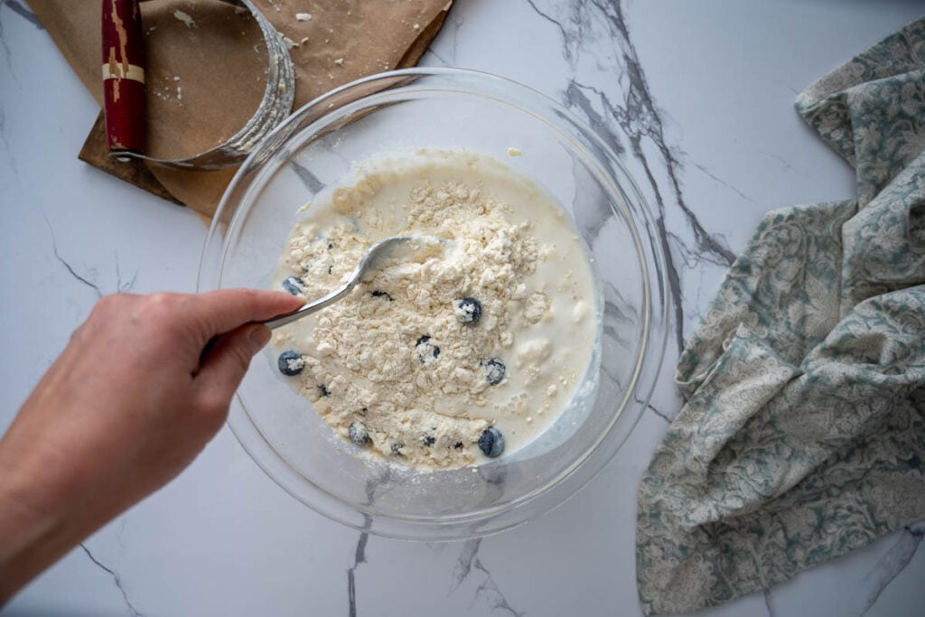 mixing wet ingredients into dry ingredients