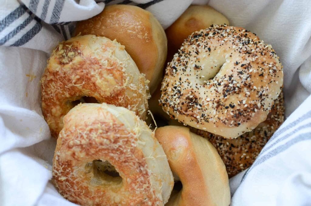 sourdough bagels in a linen lined basket