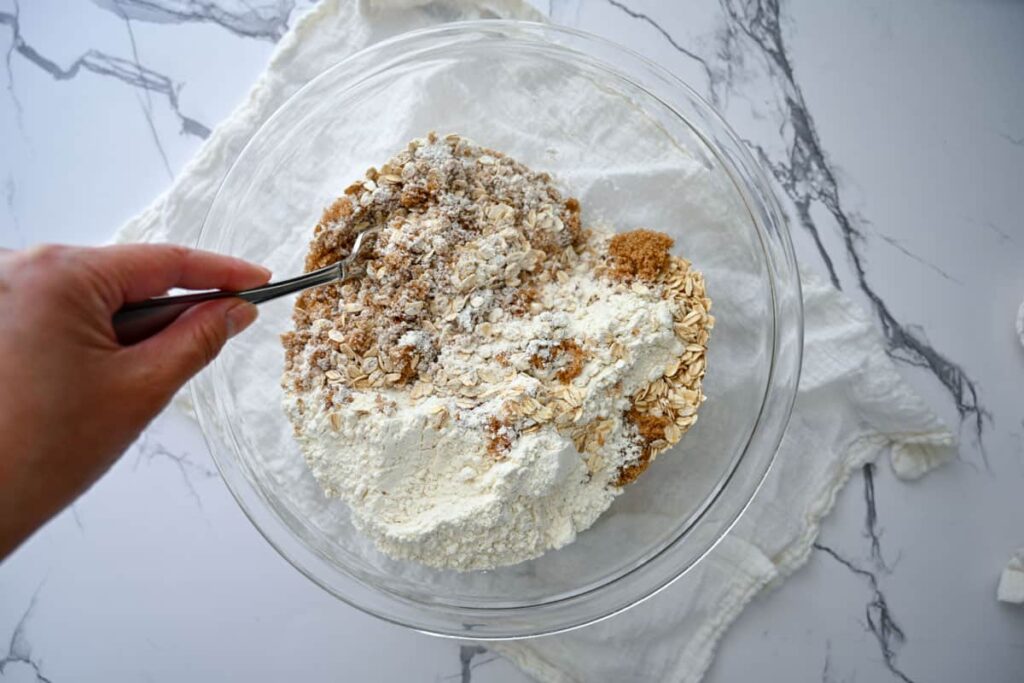 combining dry ingredients in a glass bowl