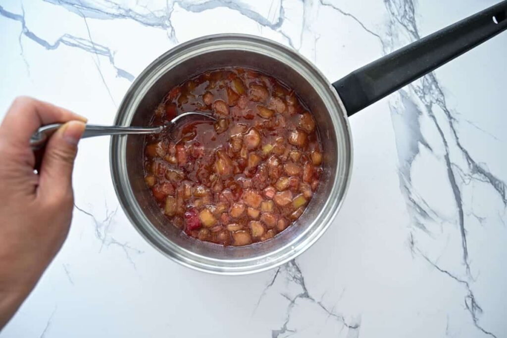 cooked rhubarb compote in a saucepan