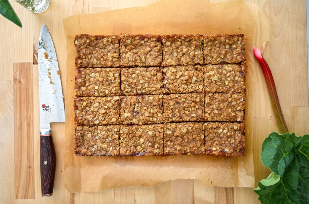 rhubarb crumble bars on wooden board