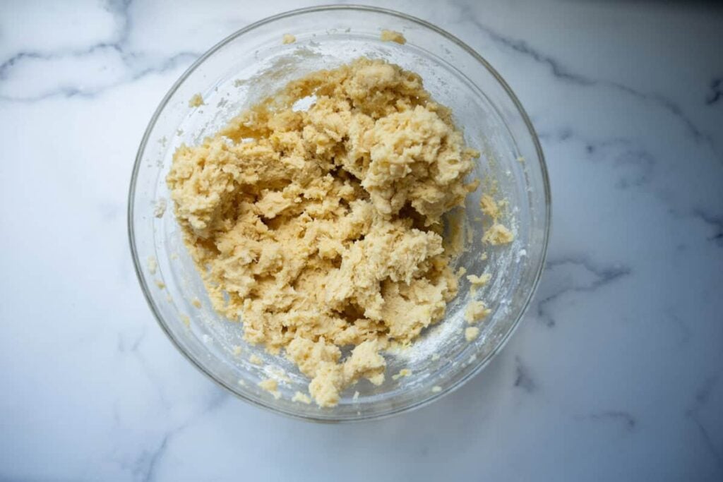 sourdough sugar cookie dough in a glass bowl
