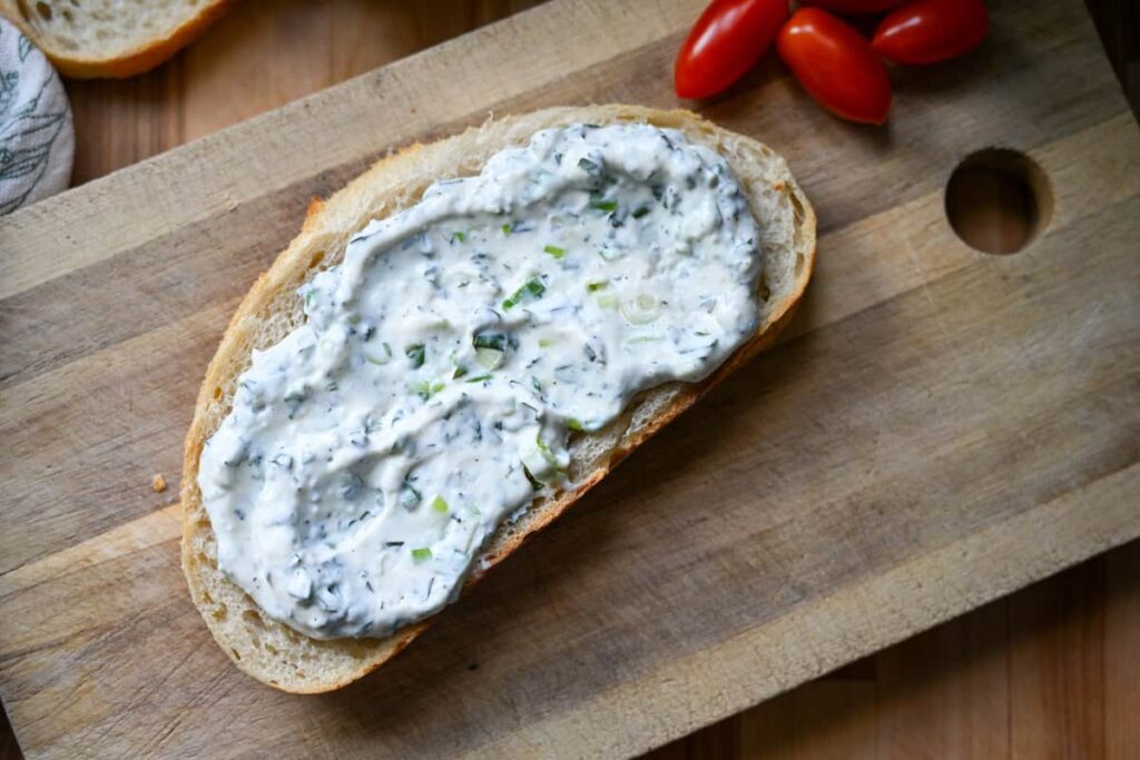 herbed ricotta on a piece of sourdough toast