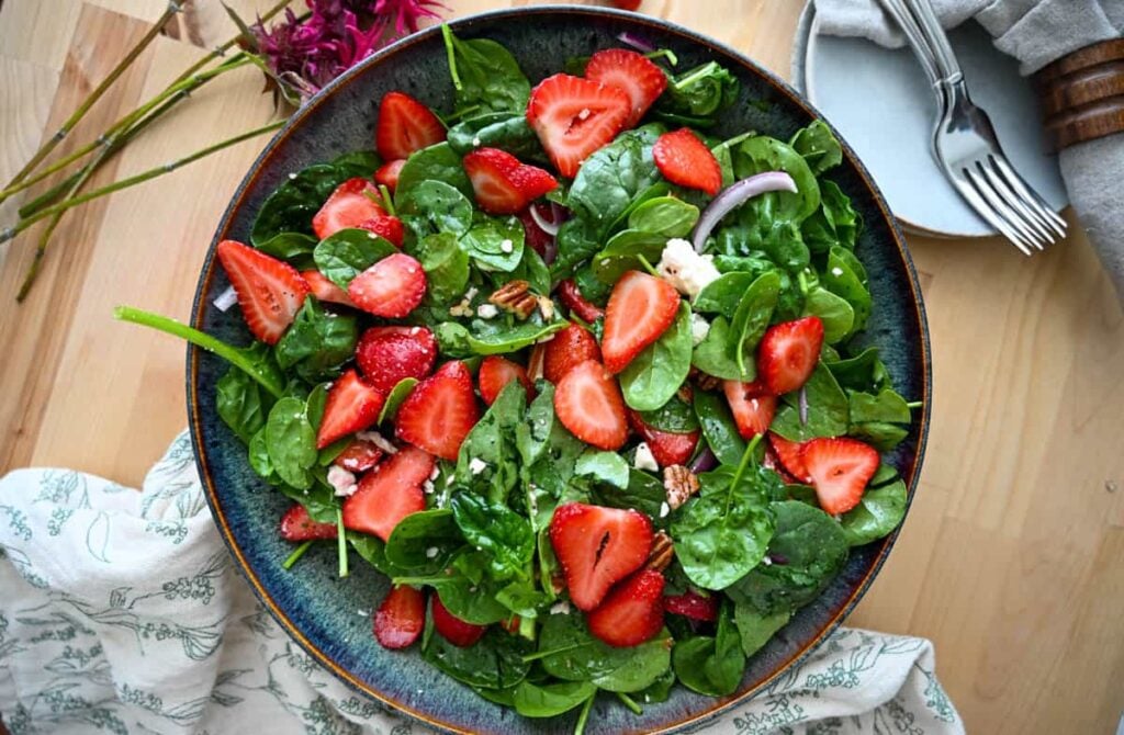 Strawberry Spinach Salad with Poppyseed Vinaigrette in a large bowl
