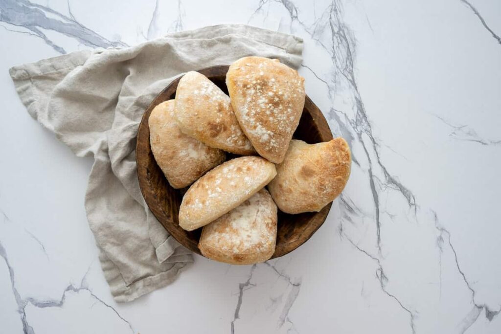 sourdough ciabatta in a wood bowl