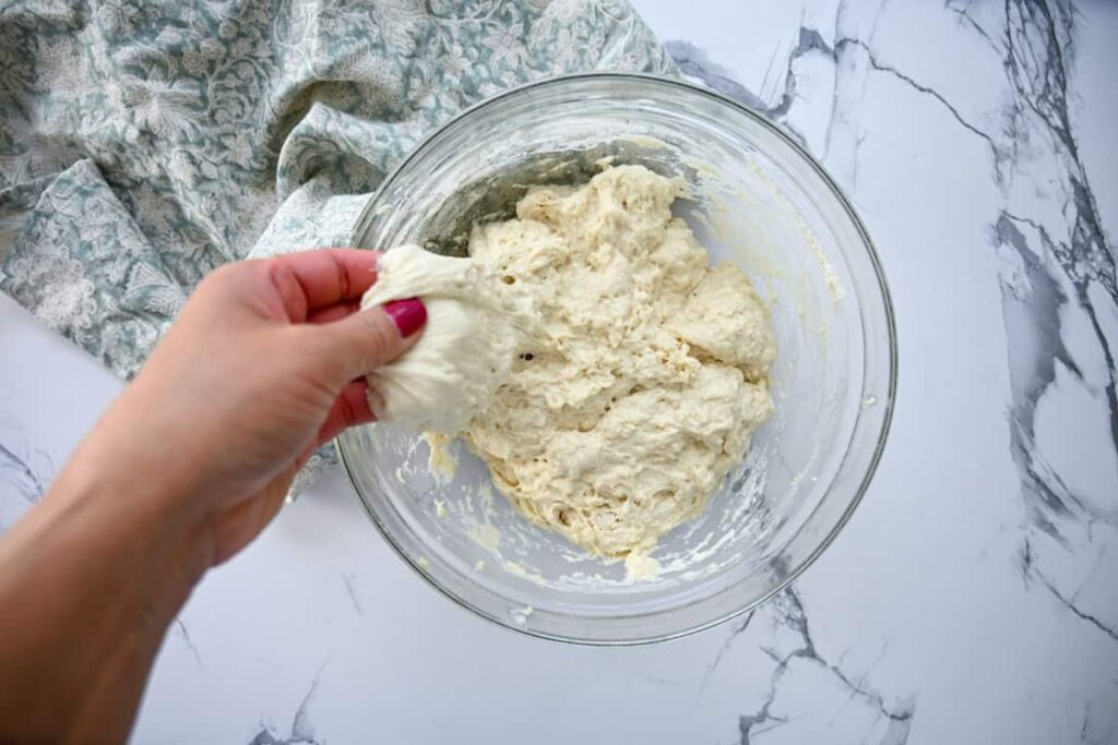 stretching sourdough ciabatta dough