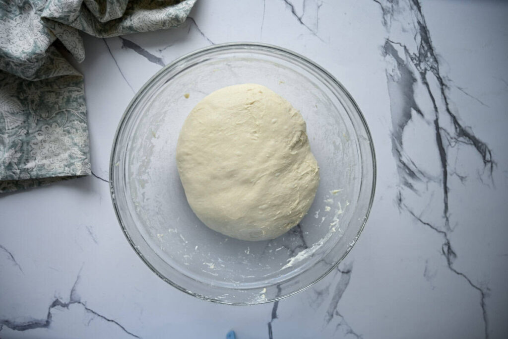 sourdough ciabatta dough in a glass bowl