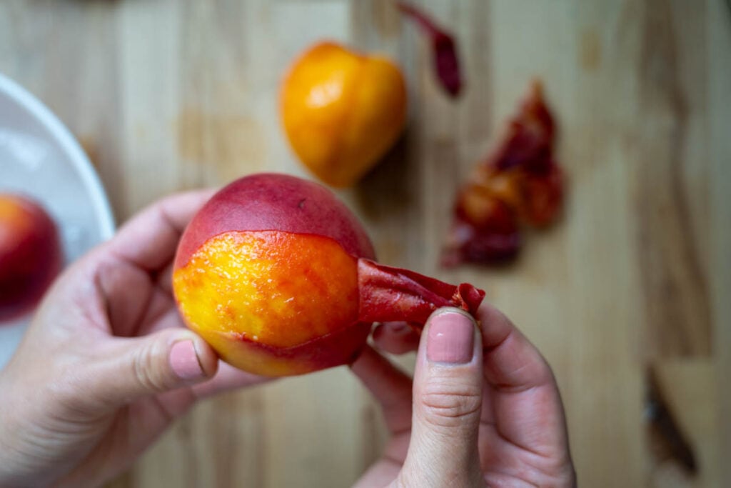 peeling peach skin off