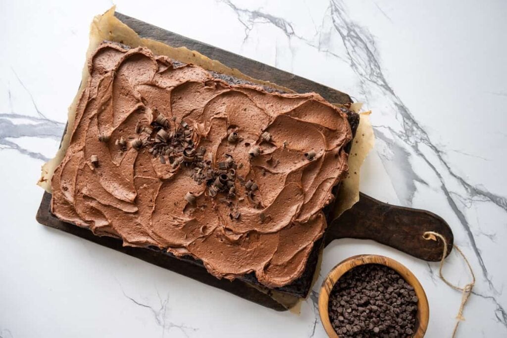 sourdough chocolate zucchini cake on a wooden board